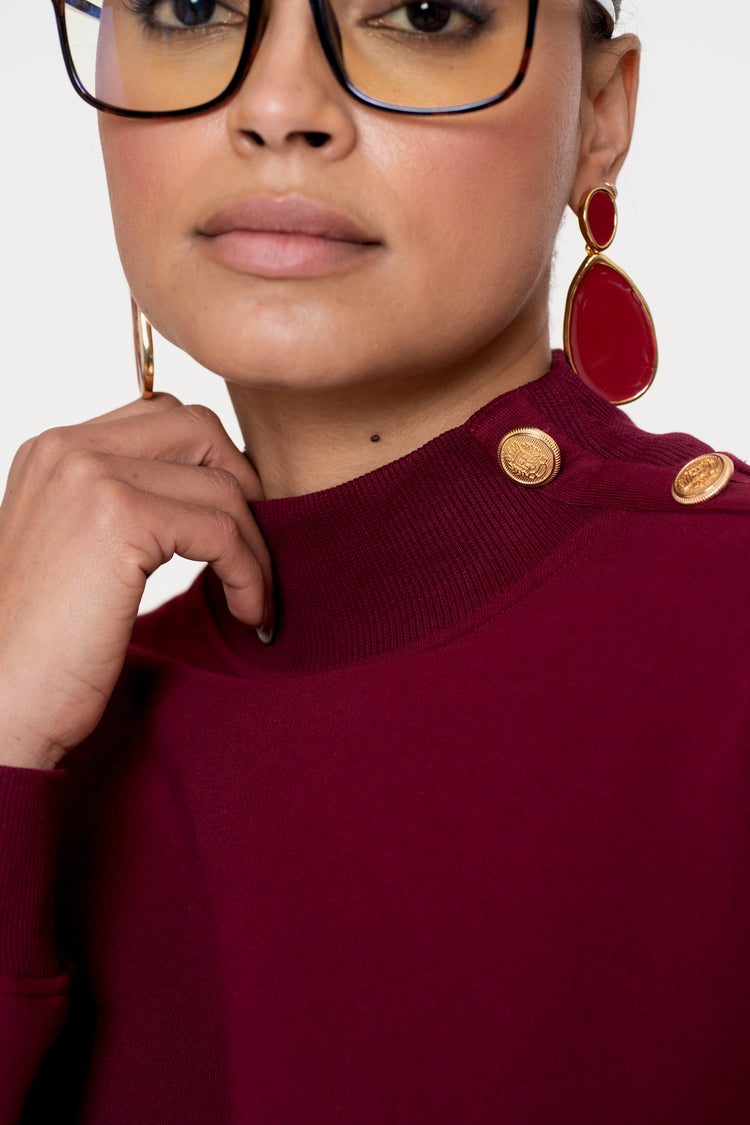 Geisha dames burgundy trui met gouden buttons
