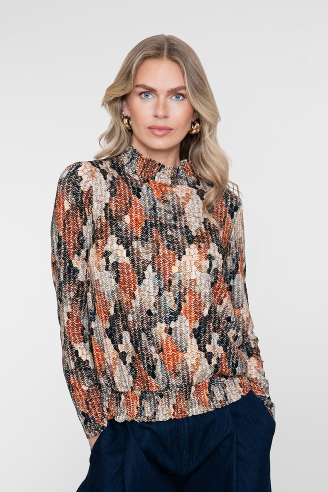 Geisha top met grafisch dessin en smockdetails