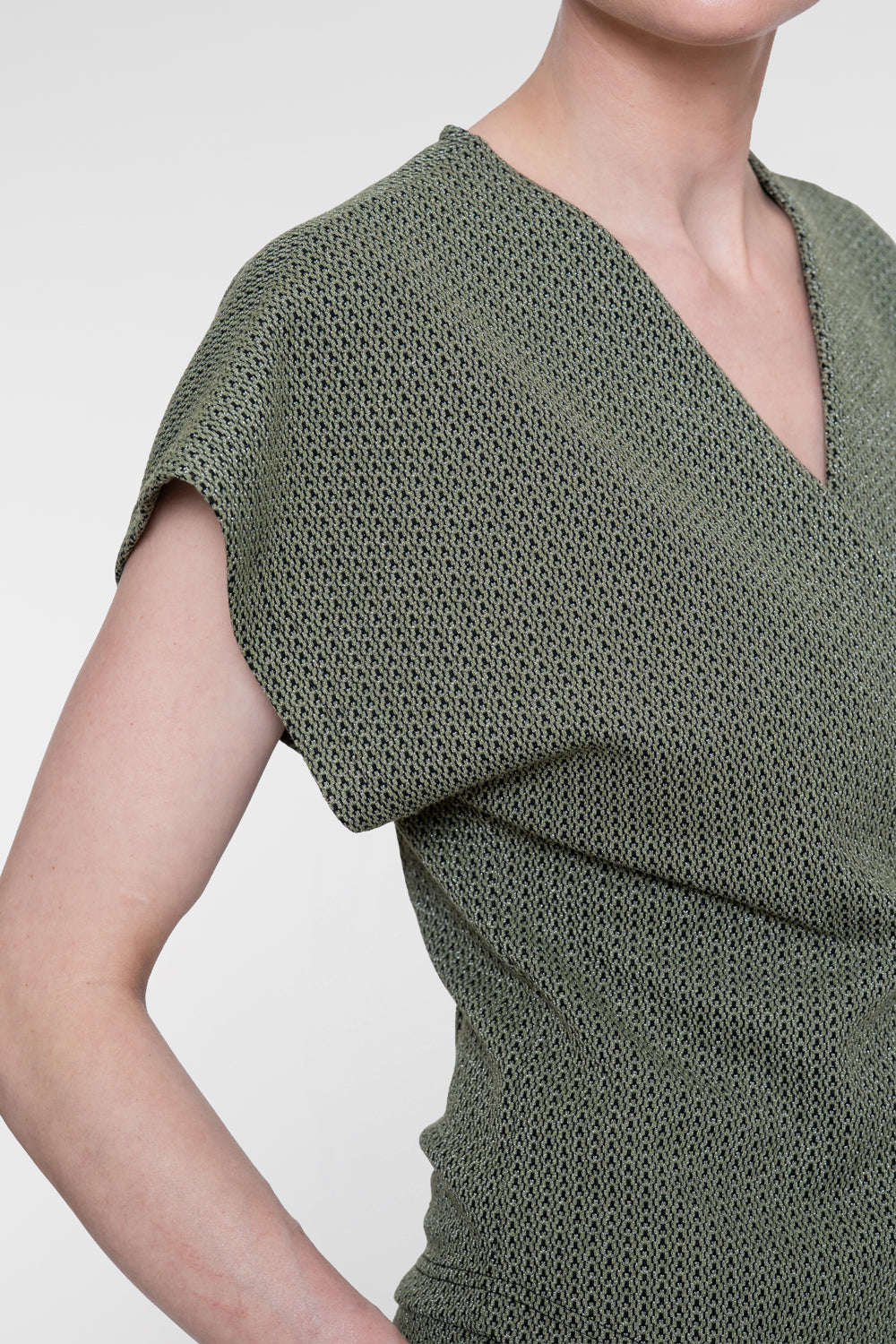 Geisha top met overslagdetail en subtiele lurexglans