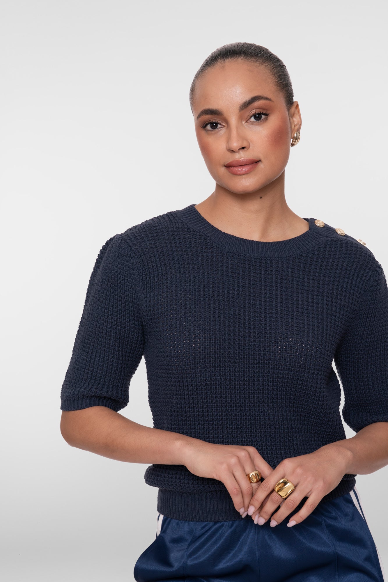 Geisha gebreide top met goudkleurige knopen