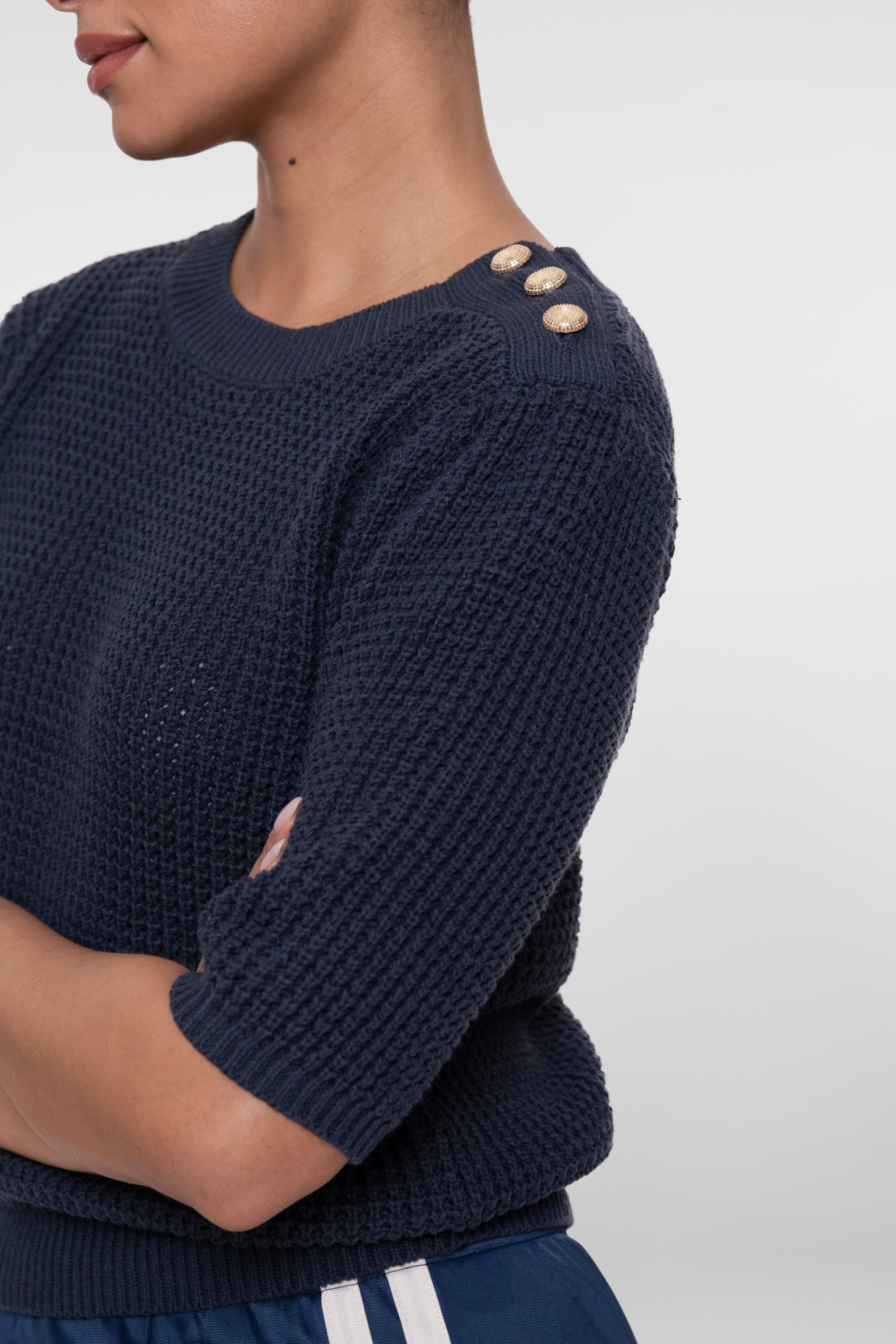 Geisha gebreide top met goudkleurige knopen