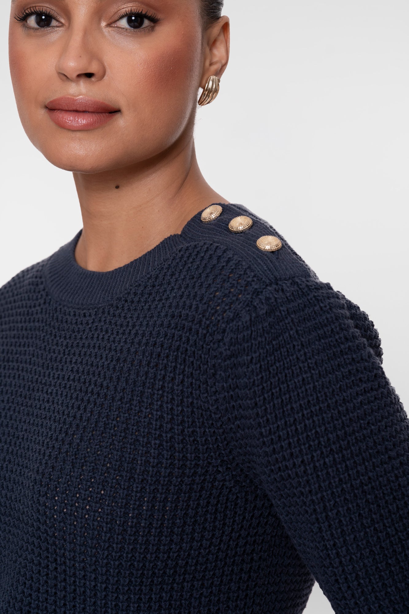 Geisha gebreide top met goudkleurige knopen